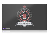An elegant Prosper-themed playmat featuring a bound tome design, perfect for Magic: The Gathering enthusiasts. Depicts intricate artwork in vibrant colors, showcasing the essence of this beloved game.