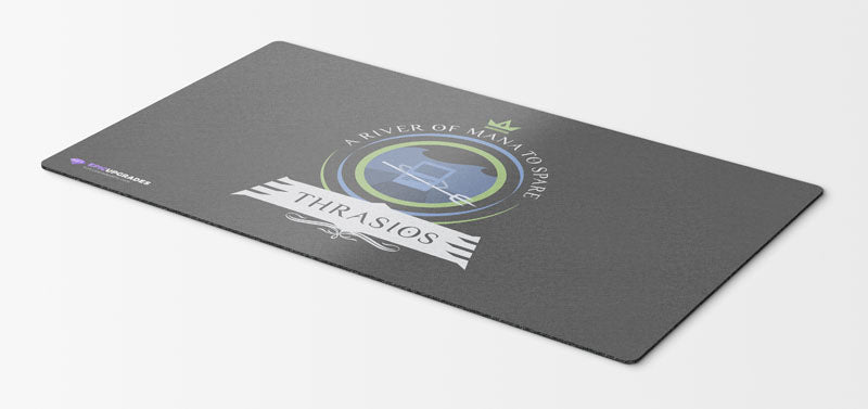 Thrashing waves surround Thrasios, the Triton Hero, as he wields immense power, ready to embark on epic adventures in the vast world of Magic: The Gathering. A vibrant and captivating playmat for devoted MTG enthusiasts.