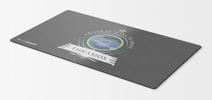 Thrashing waves surround Thrasios, the Triton Hero, as he wields immense power, ready to embark on epic adventures in the vast world of Magic: The Gathering. A vibrant and captivating playmat for devoted MTG enthusiasts.