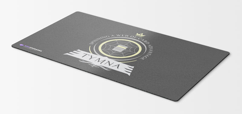 MTG-themed playmat featuring Tymna the Weaver, a legendary commander from the Magic: The Gathering card game. Tymna is a skilled weaver, surrounded by mystical threads and artifacts, ready to lead your deck to victory.
