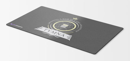 MTG-themed playmat featuring Tymna the Weaver, a legendary commander from the Magic: The Gathering card game. Tymna is a skilled weaver, surrounded by mystical threads and artifacts, ready to lead your deck to victory.
